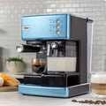 Cafetera Espresso y Cápsulas Automática PrimaLatte™ 6603 Oster1#Celeste