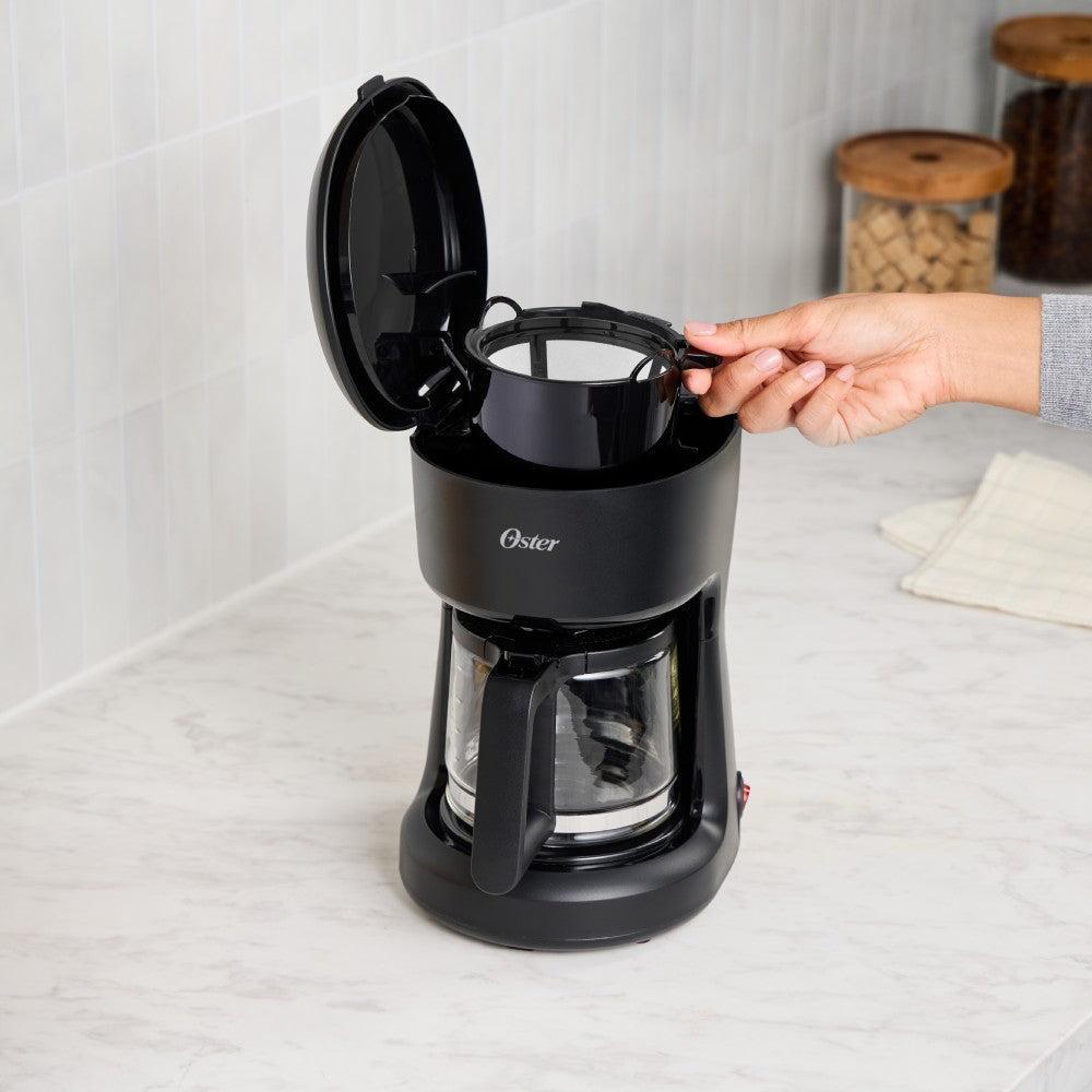 Cafetera a Goteo 5 Tazas Función Pausa Y Servir BVSTDCS51B Oster5#Negro