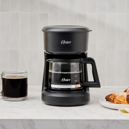 Cafetera a Goteo 5 Tazas Función Pausa Y Servir BVSTDCS51B Oster1#Negro