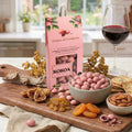 Grageas de cranberries en chocolate rosado 90 grs Kokoa Roots.-Gourmet